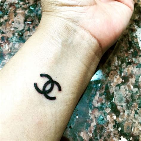 chanel cy tattoo